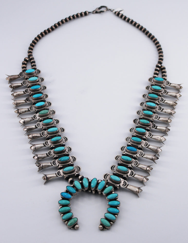 Danny Clark: Campitos and Kingman Turquoise "Bow Tie" Squash Blossom Necklace